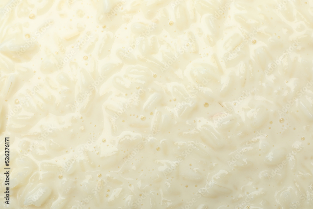 Delicious rice pudding as background, closeup view Delicious rice pudding as background, closeup view