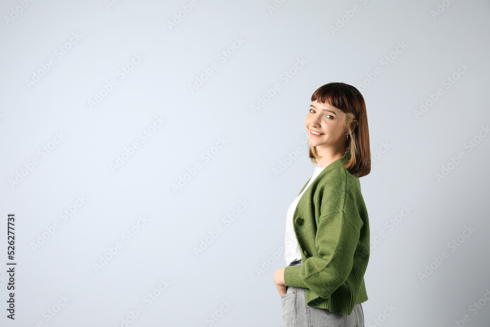 Beautiful young girl smiling on white background. Space for text Beautiful young girl smiling on white background. Space for text