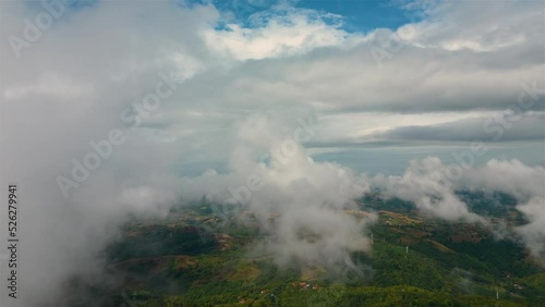 Aerial time lapse of fog over hills, after rain