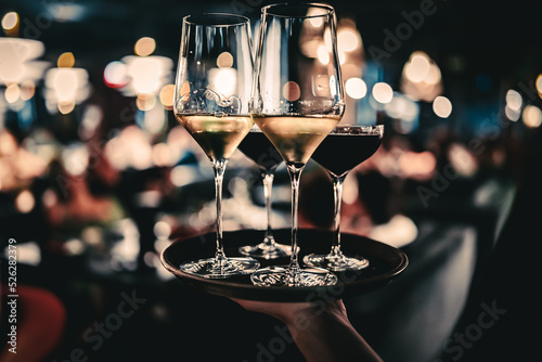 alcohol cocktail and wine set on a waiter tray in bar