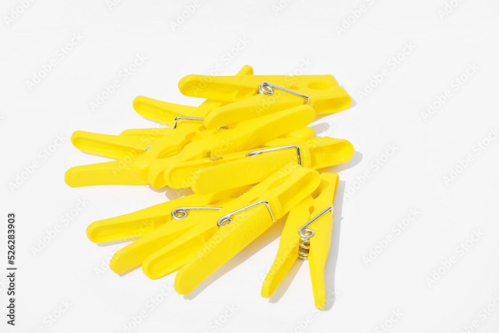 Plastic clothespins on white background Plastic clothespins on white background