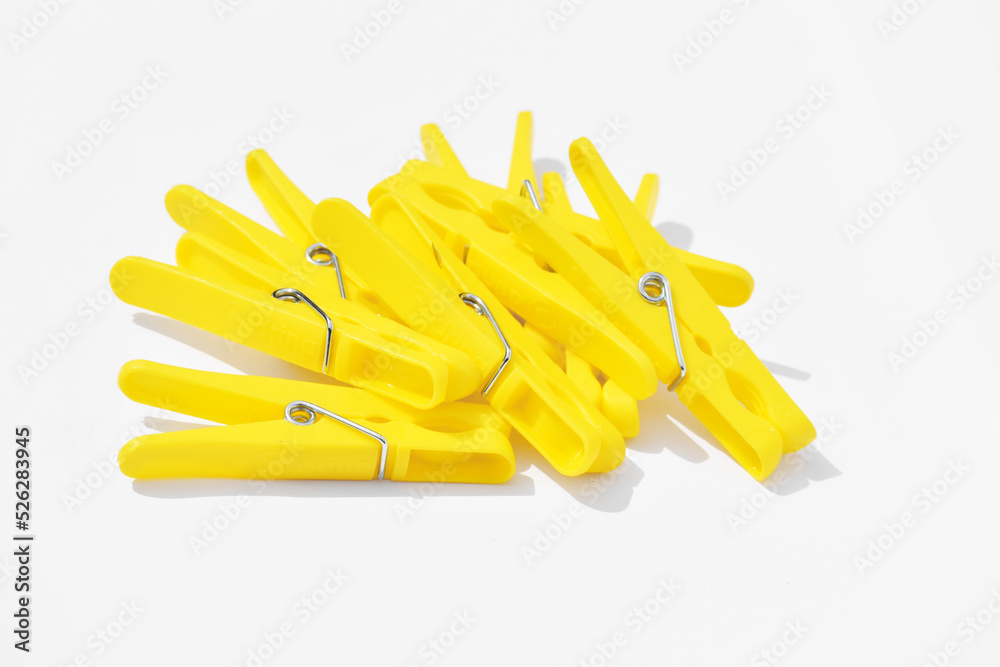 Plastic clothespins on white background Plastic clothespins on white background