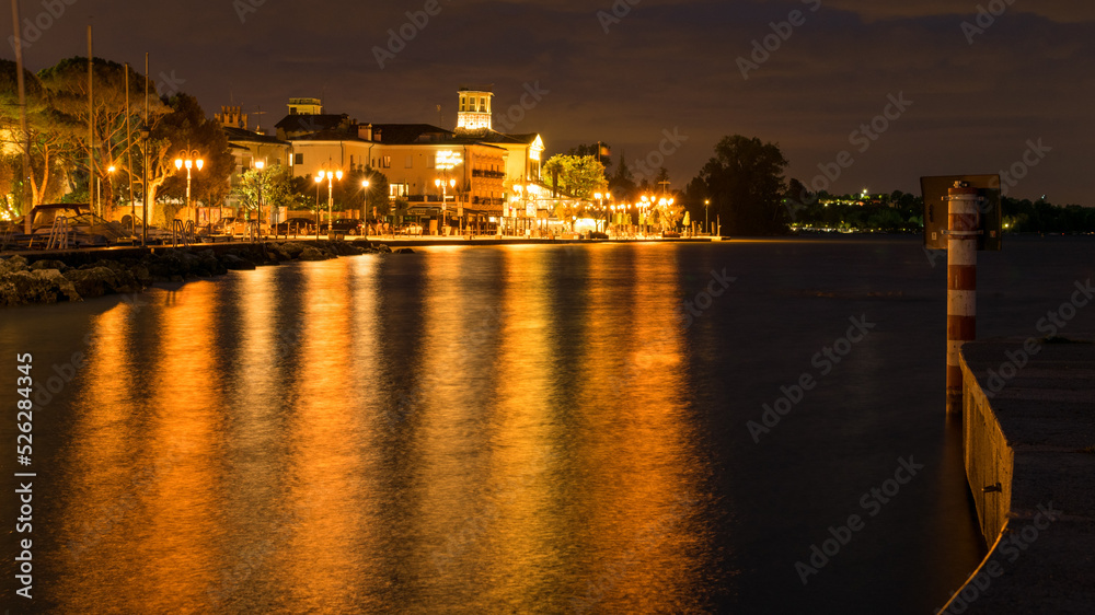 night view of the city of lazise