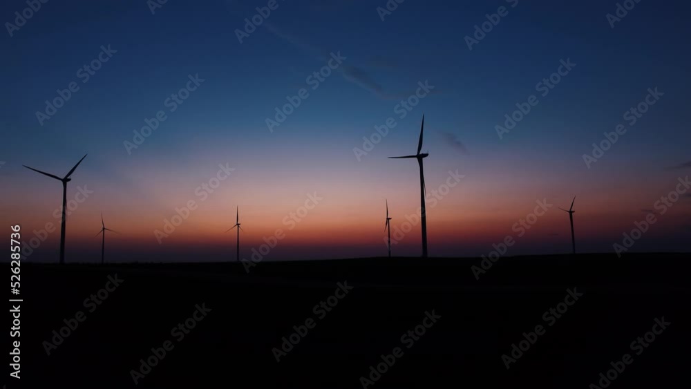 Windmill farm park and turbines for producing green electricity. Drone point of view. Windmill farm park and turbines for producing green electricity. Drone point of view.