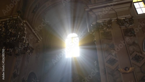 Bright light from the window of an ancient Christian church. The concept religion and faith in God photo