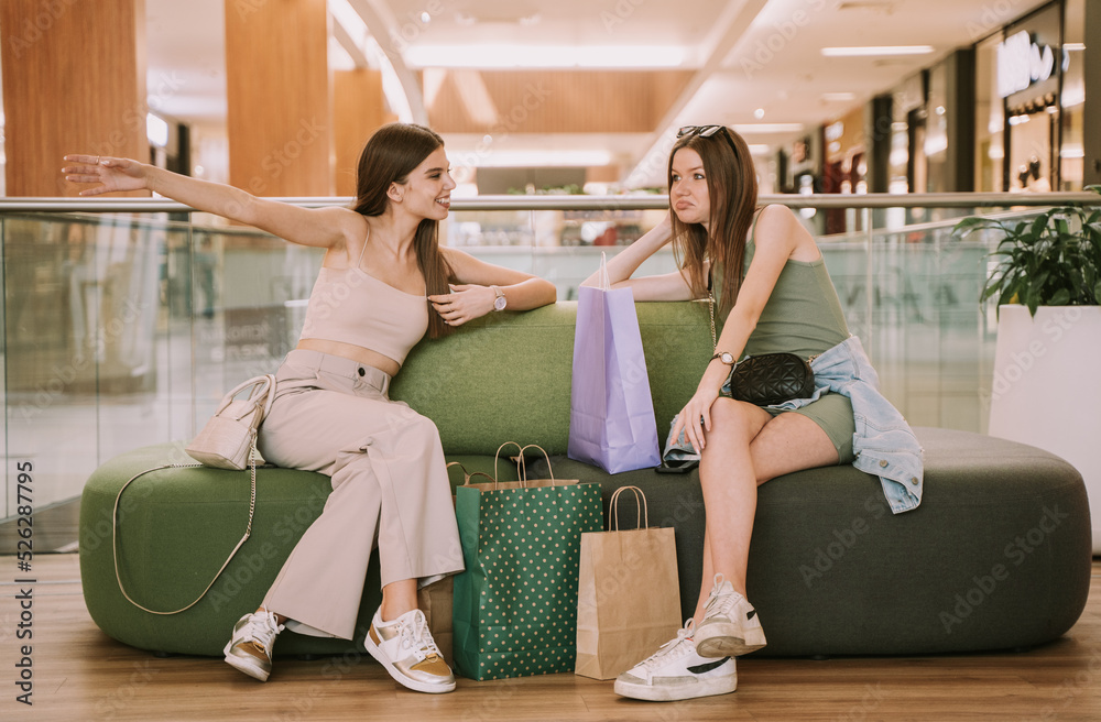 Two girls at a shopping mall