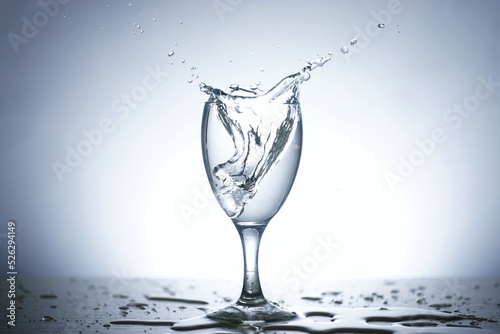This is photo of water scattered in glass.