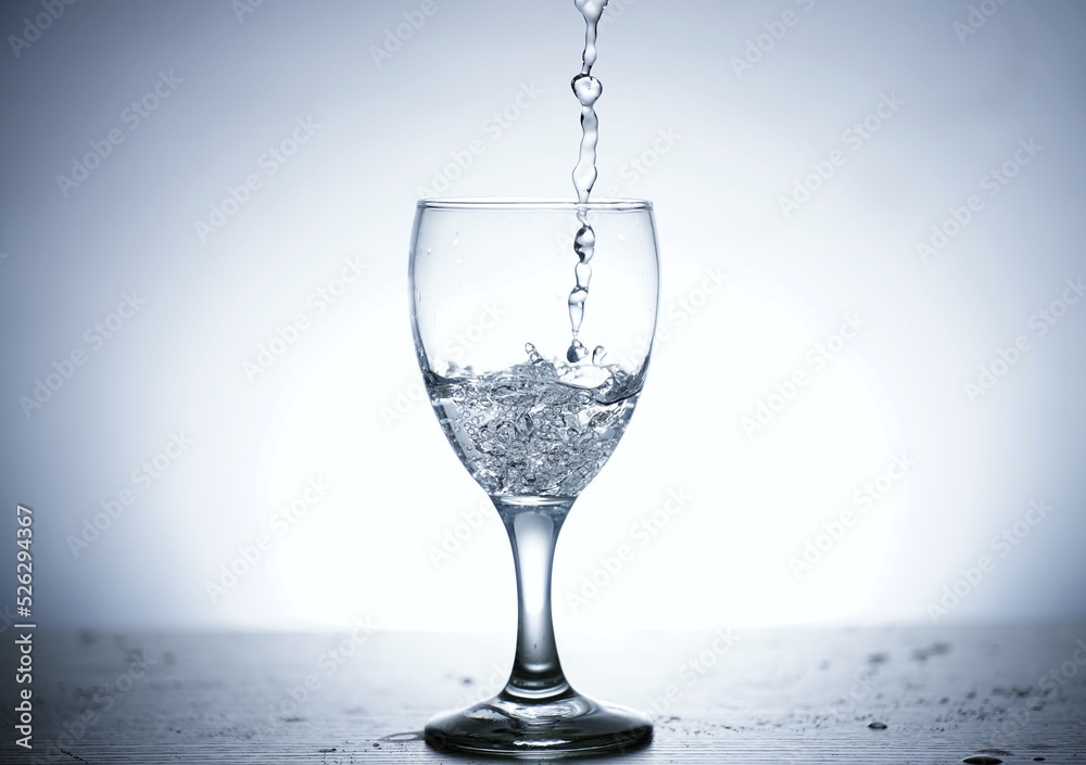 This is photo of water scattered in glass. This is photo of water scattered in glass.