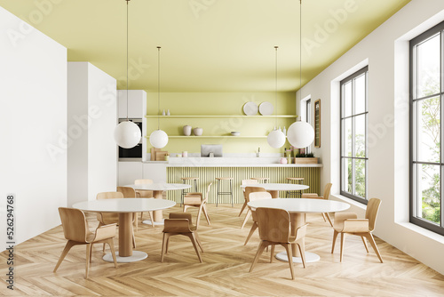 Green cafe interior with cooking and eating area  countertop and window