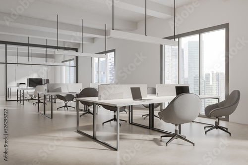 Corner view on bright office interior with panoramic windows © ImageFlow