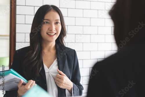 Confidence before get interview in the first jobber, Young woman looks at the mirror and practicing talking to herself preparing to interview job.