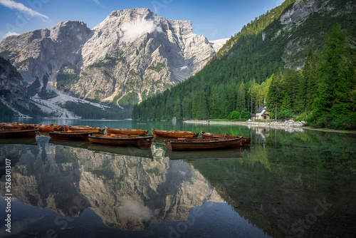 Beautiful view of lake and mountain of Lake Braies is alpine lake in the Dolomites in South Tyrol in Italy. Boat rental services provide for tourist.