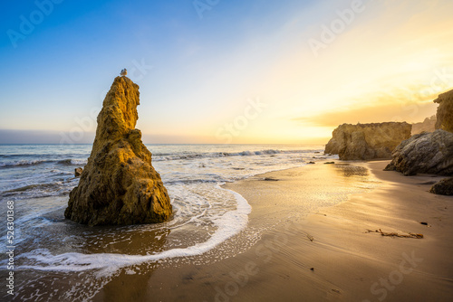 the famous el matador beach during sunset, california photo