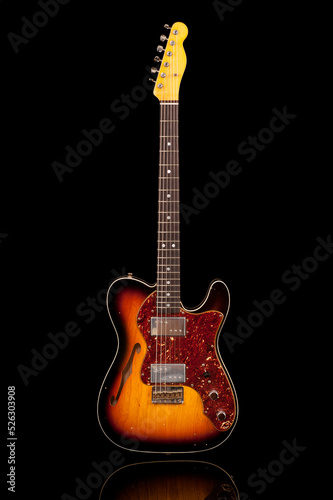 electric guitar on a black background, with reflection, custom