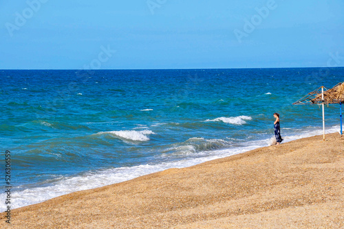 the city of Baku The coast of the Caspian Sea the end of the beach season the girl came to spend the last sunny days of summer