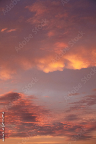 Beautiful sunset sky with clouds. Amazing summer sunset background