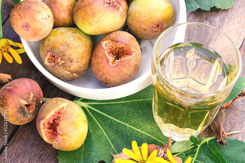Organic figs and wine on table, healthy and delicious food 