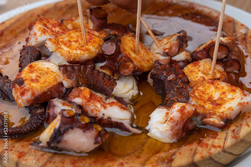 Ration of pulpo a feira, typical Galician recipe for cooking octopus.