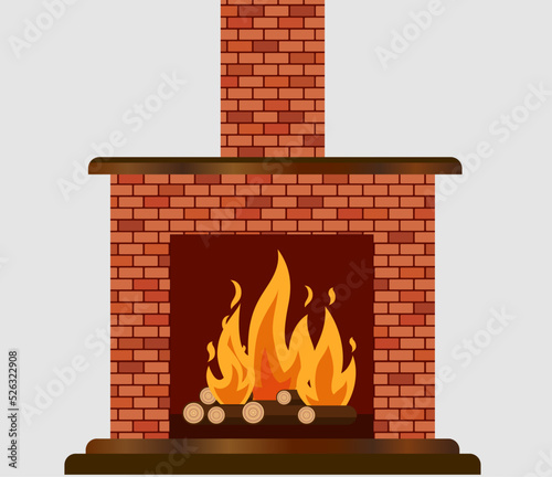 Brick fireplace with burning logs and a wood mantle 