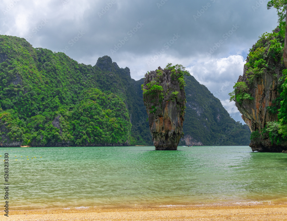 Obraz premium Phangna Bay with many Islands near Phuket Thailand. Lovely rock in the middle of the ocean surrounded by mountains