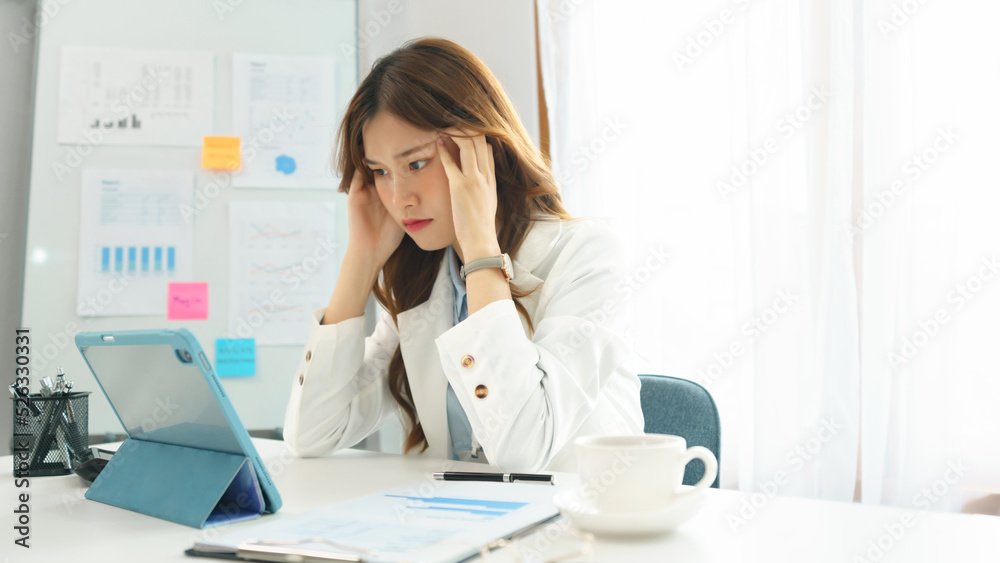 Business concept, Businesswoman feeling stressed while working hard to thoughtful about new project