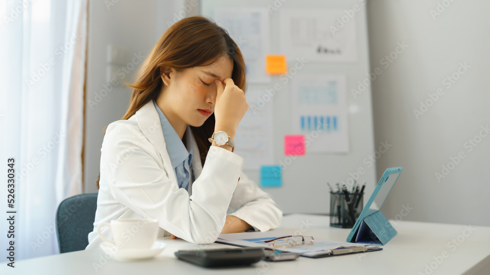 Successful business concept, Businesswoman feeling headache after working hard about new project Successful business concept, Businesswoman feeling headache after working hard about new project