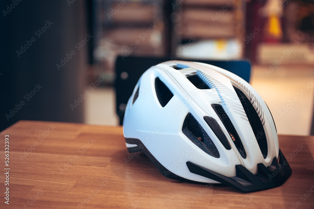 Fototapeta premium bicycle helmet on a table