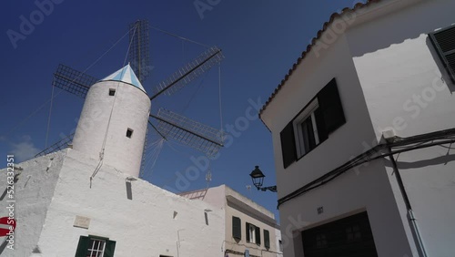 Windmill and whitewashed houses in Sant Lluis, Sant Lluis, Menorca, Balearic Islands photo