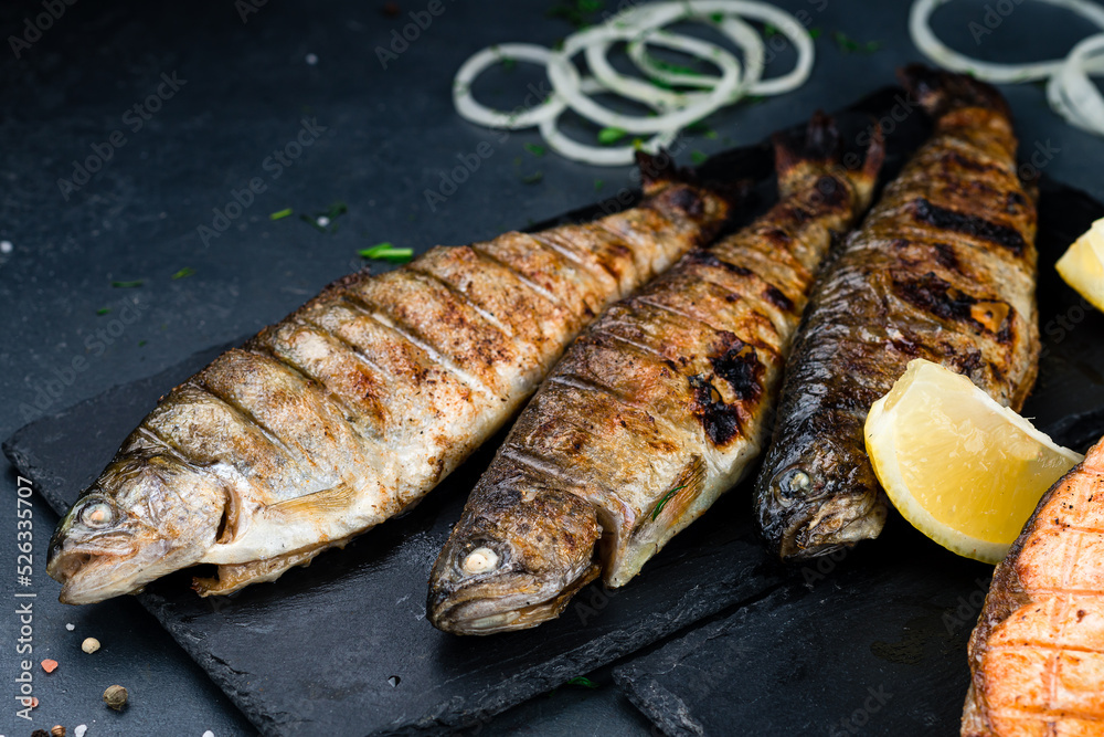 Baked trout fish, Grilled trout barbeque with lemon, Healthy eating concept Baked trout fish, Grilled trout barbeque with lemon, Healthy eating concept