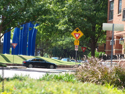 A car using the roundabout at Addison Circle in Addison, Tx. This is one of the most interesting traffic circles around. 