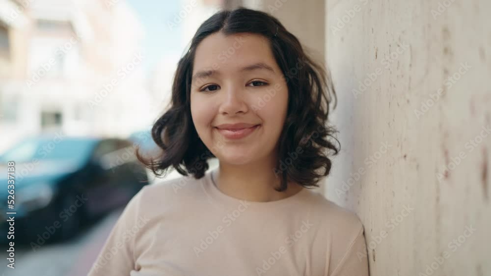 Young woman smiling confident standing at street Young woman smiling confident standing at street