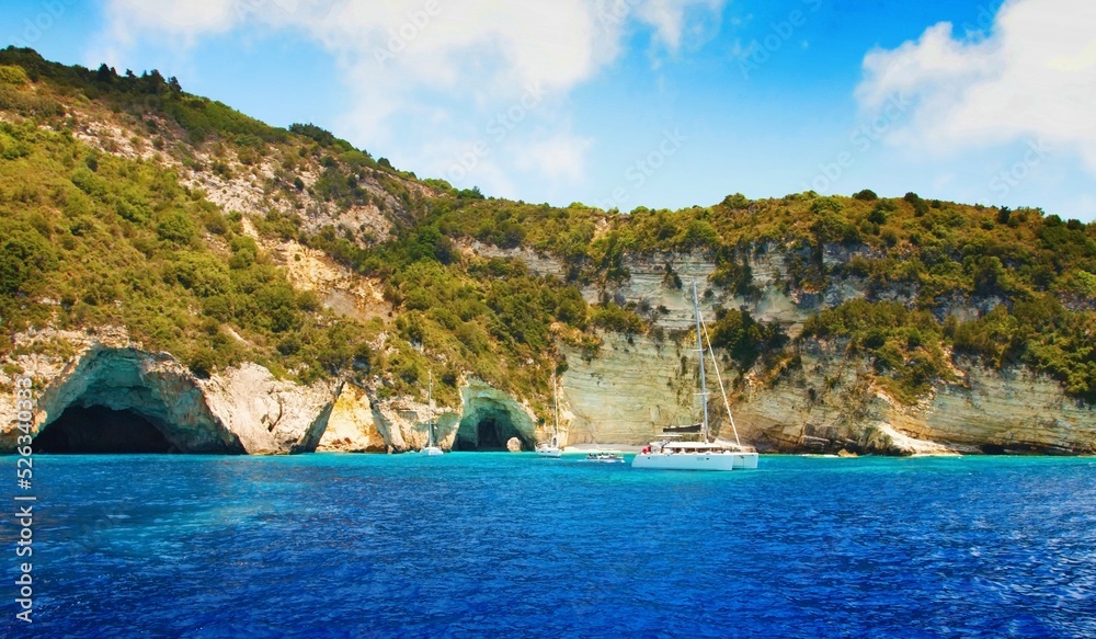 Paxos.Blue cave and bay in the Ionian sea in Greece.