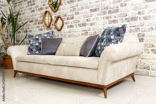 beige colorer elegance sofa side view stok photo