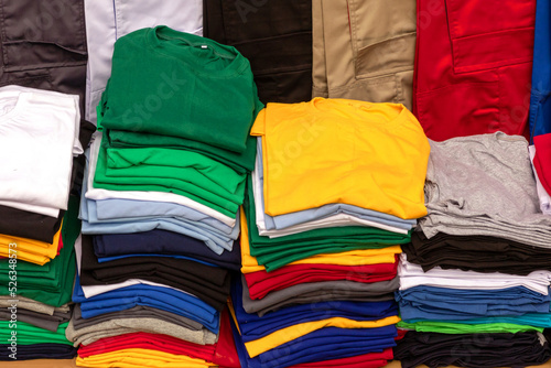 Stack of colorful cotton shirts