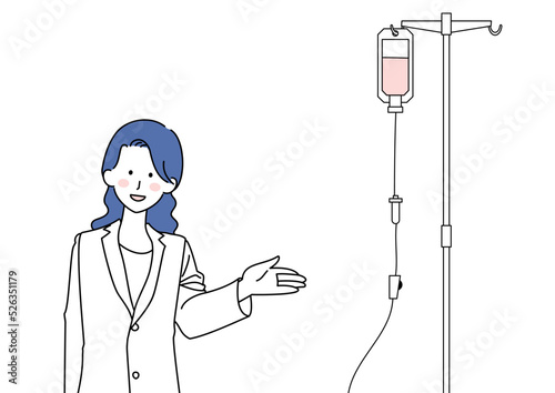 点滴を示す白衣の女性