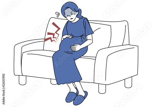お腹の痛みに苦しむ妊婦