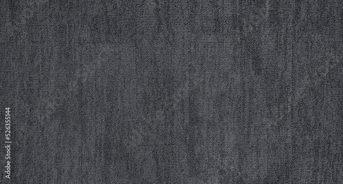 close up of monochrome grey carpet texture background from above. texture tight weave carpet. the dark color background of the carpet.