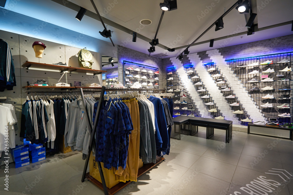 SINGAPORE - CIRCA JANUARY, 2020: interior shot of Adidas store in Singapore  Changi Airport. Stock Photo | Adobe Stock