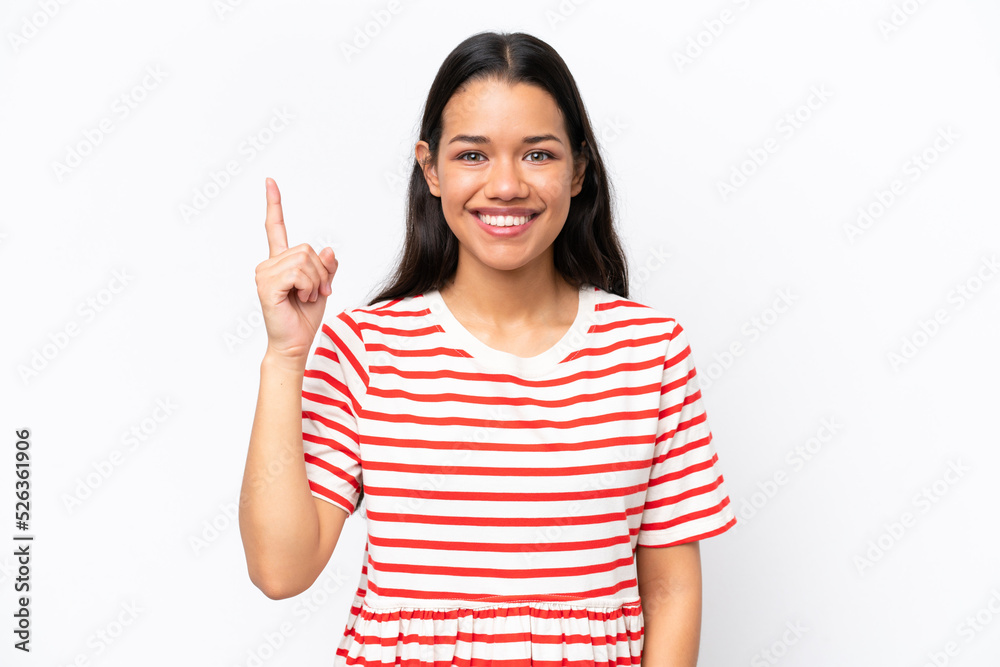 Young Colombian woman isolated on white background pointing up a great idea Young Colombian woman isolated on white background pointing up a great idea