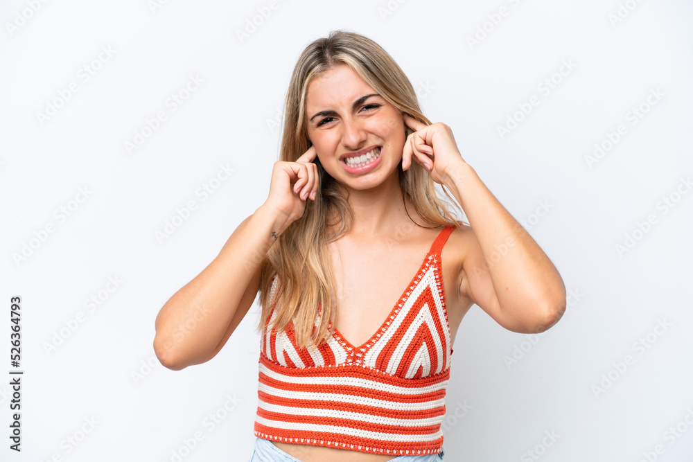 Young caucasian woman isolated on white background frustrated and covering ears Young caucasian woman isolated on white background frustrated and covering ears