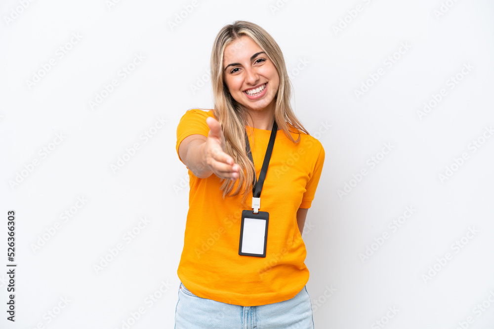 Young caucasian woman with ID card isolated on white background shaking hands for closing a good deal Young caucasian woman with ID card isolated on white background shaking hands for closing a good deal