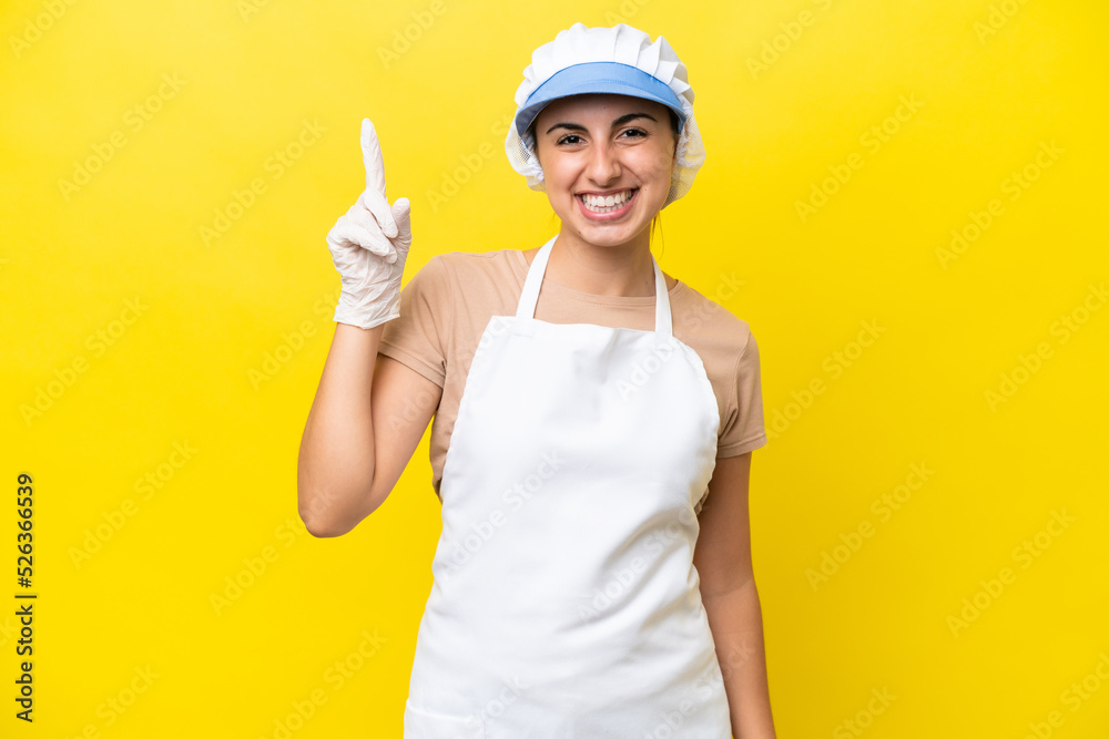 Fishwife woman over isolated background pointing up a great idea Fishwife woman over isolated background pointing up a great idea