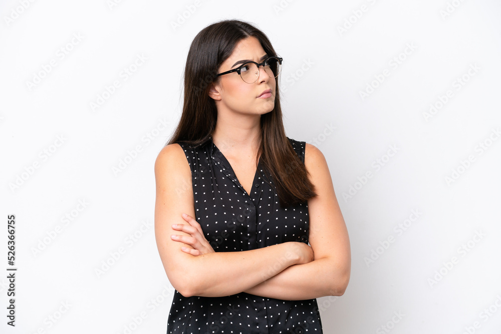 Young Brazilian woman isolated on white background keeping the arms crossed Young Brazilian woman isolated on white background keeping the arms crossed