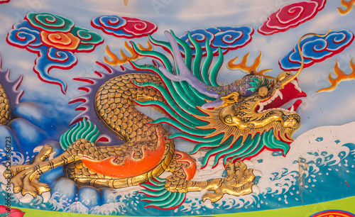 Beautiful Dragon Sculpture ,The  dragon is a mythical creature in China(Nacha Sa Thai Chue Shrine or Naja Shrine) Bang Sean, Chonburi, Thailand © Charisia