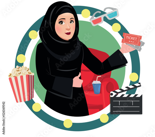 Arab female muslim saudi woman or girl watching movie in a Cinema or theater. Wearing burka Holding tickets for film. Government has lifted the ban off cinemas in saudi arabia for entertainment.