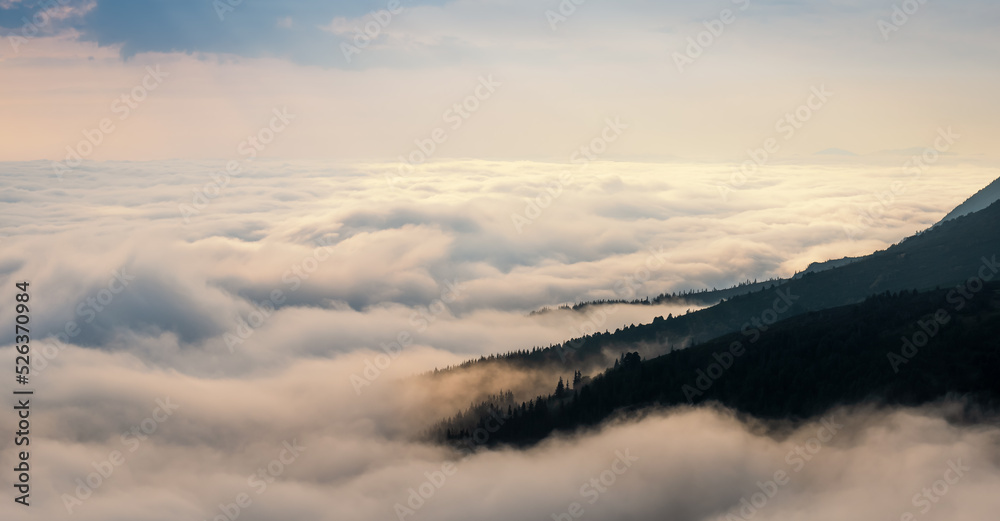 Flight high above the clouds. Landscape in the Ukrainian Carpathians