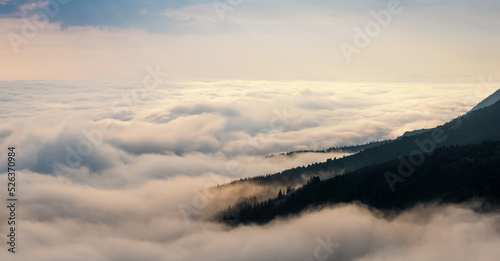 Flight high above the clouds. Landscape in the Ukrainian Carpathians © lesia