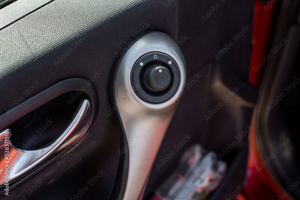 Fototapeta premium Automatic mirror adjustment in the car. Joystick for mirror adjustment