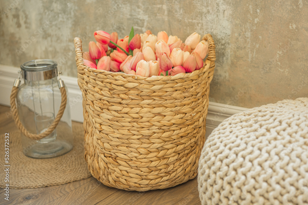 Artificial tulips in a wicker basket