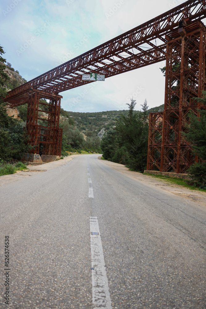 An old metal bridge, crossing the valley, was used by Omar Mukhtar in the war against the Italians
